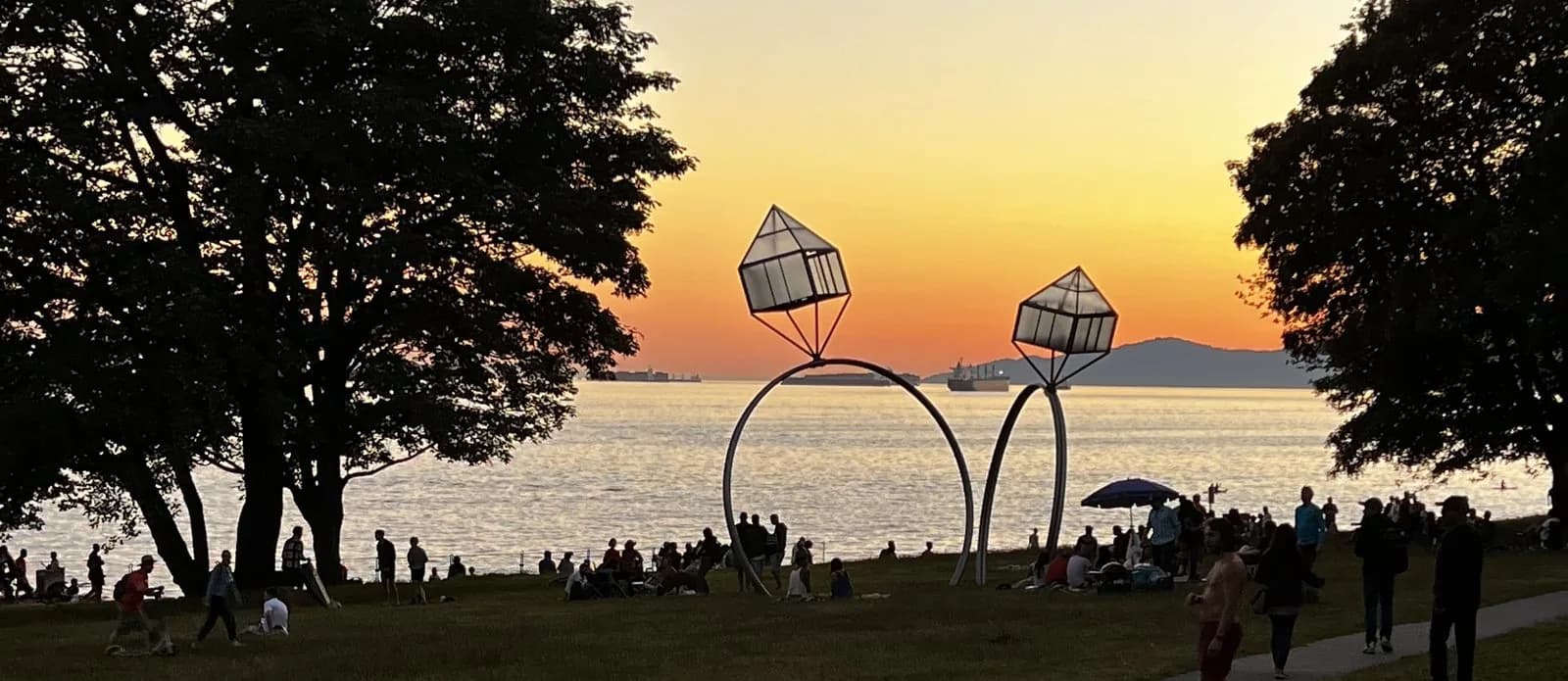 Sunset at English Bay with the Engagement sculpture, late afternoon in Vancouver